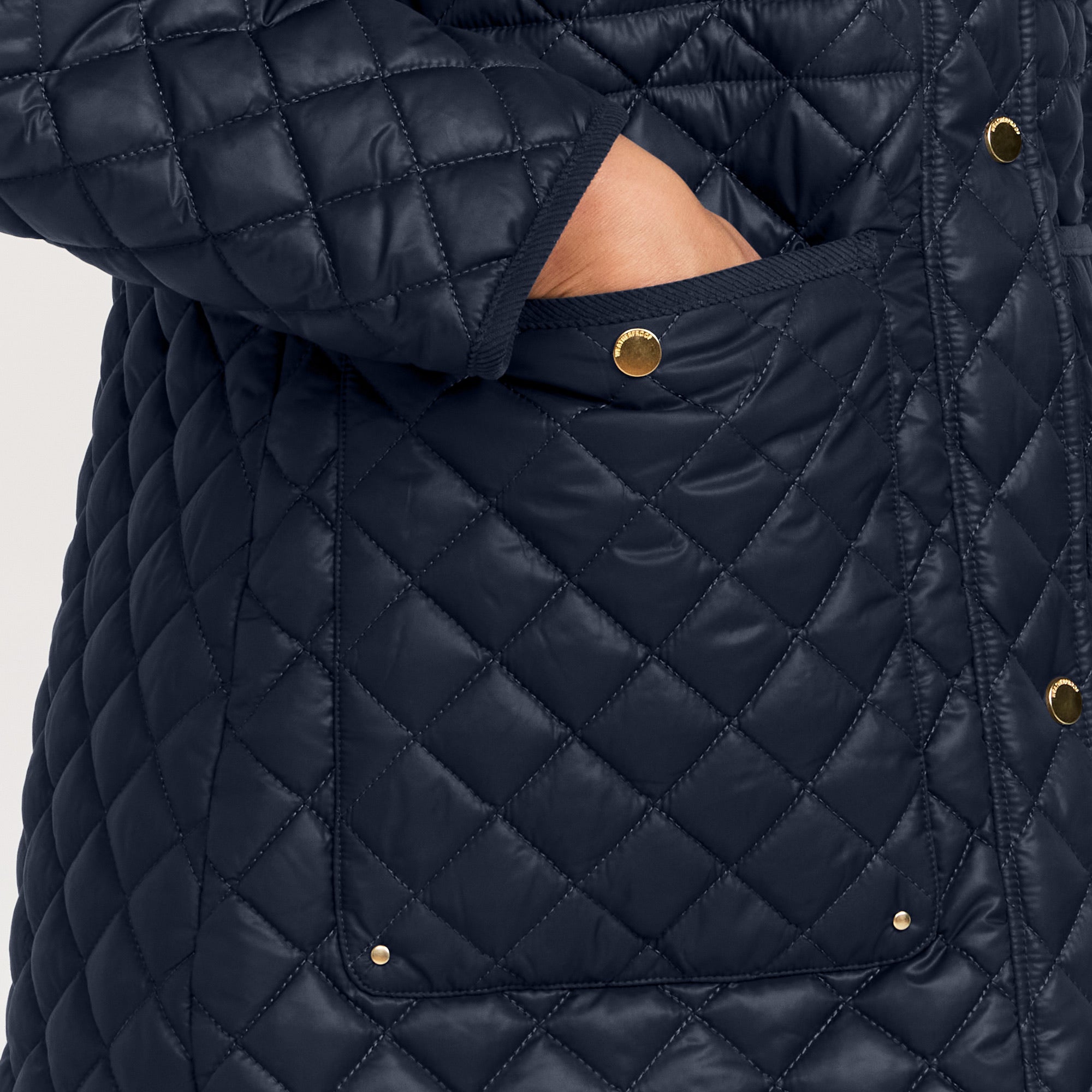 HOODED CORDUROY TRIMMED QUILTED WALKER