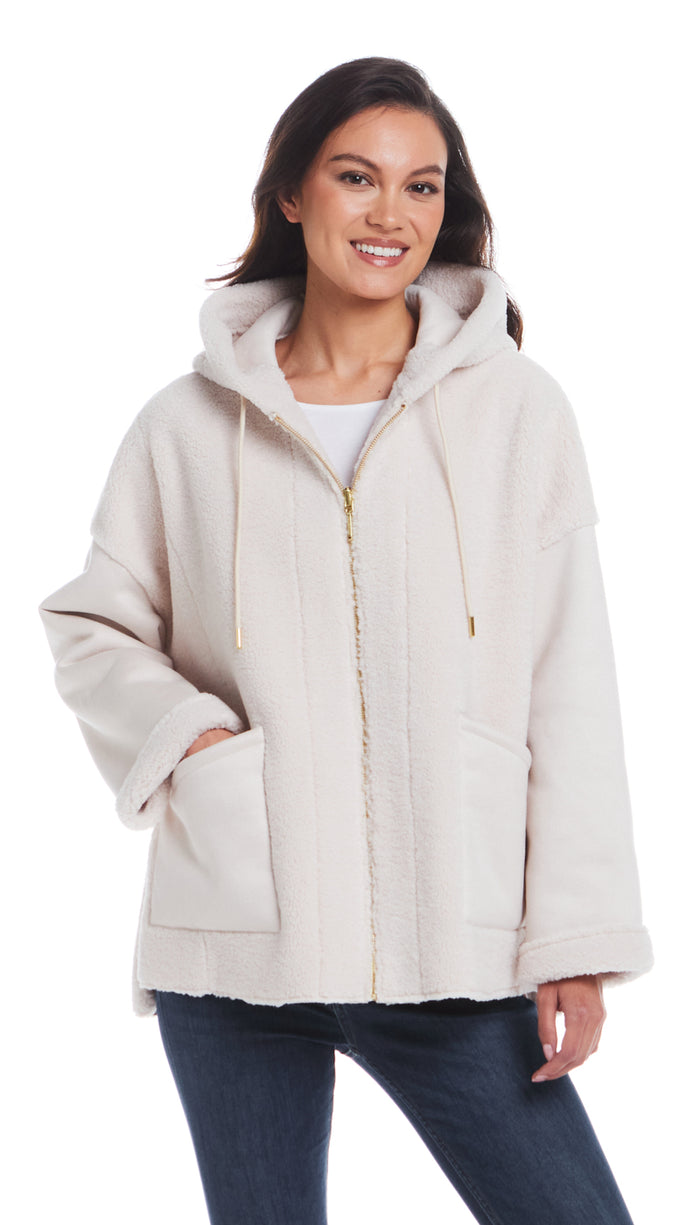 a woman in a white coat