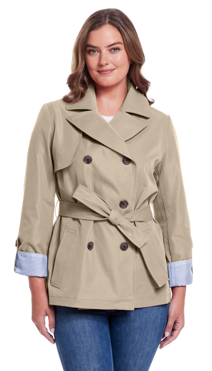 a woman wearing a trench coat